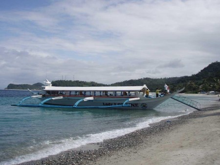 A banka passenger ferry 'docked' at the beach